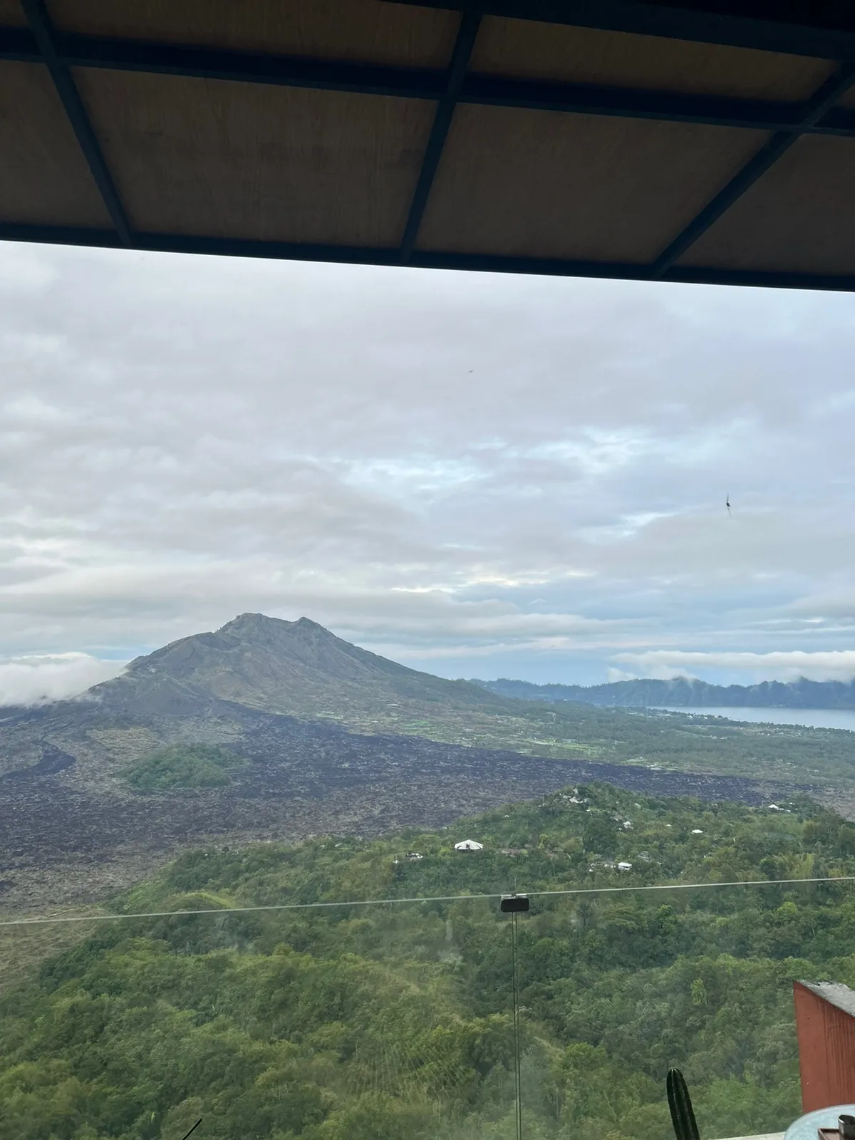 Mount Batur rising above the clouds at sunrise, Bali